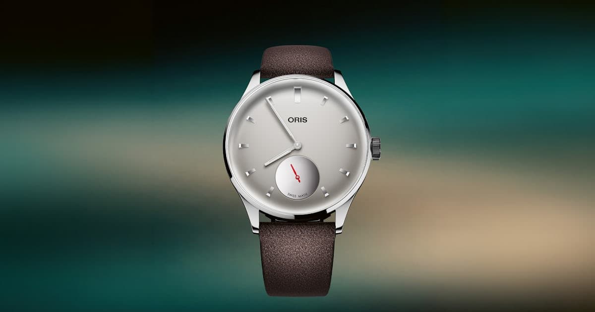 Oris Hölstein Edition 2026 with small seconds and grey suede strap.
