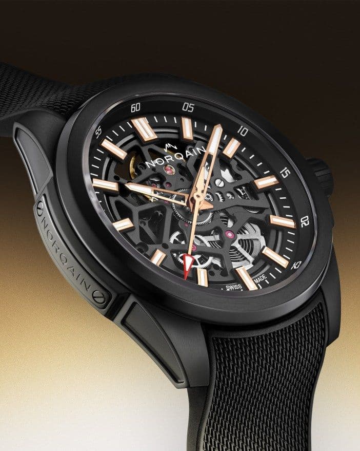 NORQAIN Independence Skeleton Titanium DLC on black Milanaise-pattern rubber strap